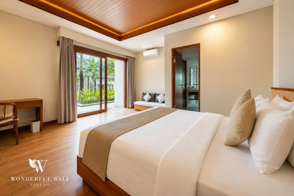 Bedroom with garden view and ensuite bathroom in Tumbak Bayuh, Bali