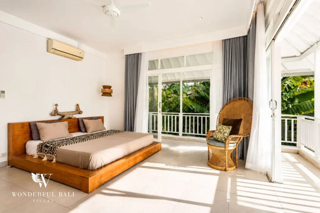 Bedroom with garden view through window, 4-bedroom family villa in Berawa, Canggu