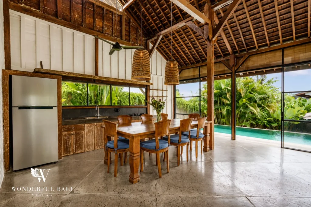 Combined wooden living and dining area, 4-bedroom dual-villa compound in Pererenan