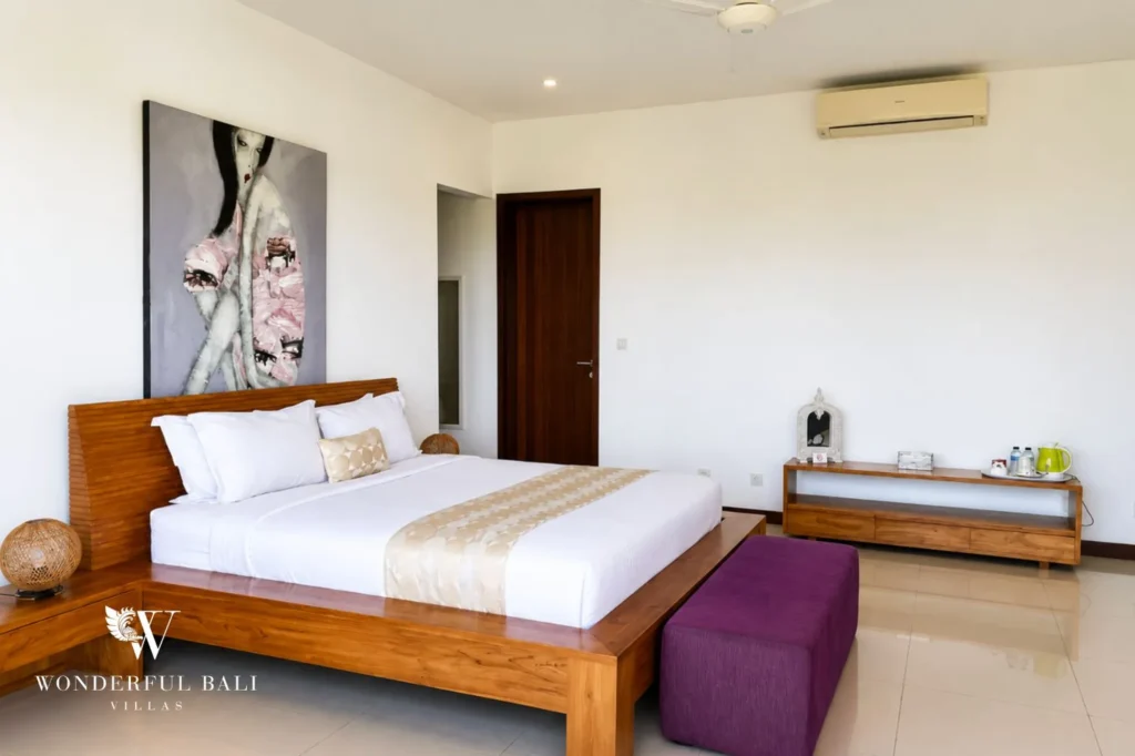 Bedroom with a private seating area, 5-bedroom villa in Batu Bolong, Canggu