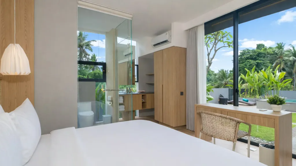 Villa Umahan, Ubud — bedroom, opening to a bathroom and looking out to the private pool, Villa Umahan