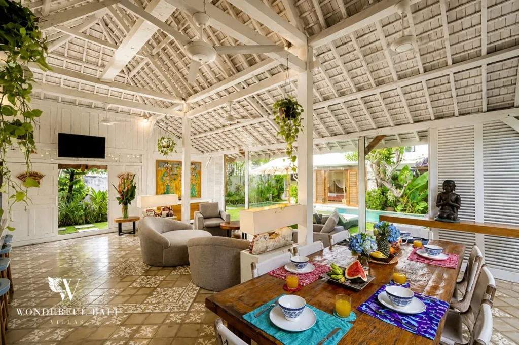 Combined living and dining area opening to garden, 4-bedroom villa in Petitenget, Seminyak