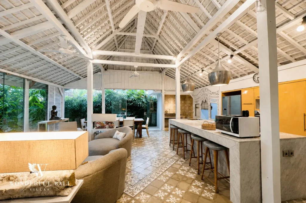 Dining table with view onto the pool, 4-bedroom villa in Petitenget, Seminyak