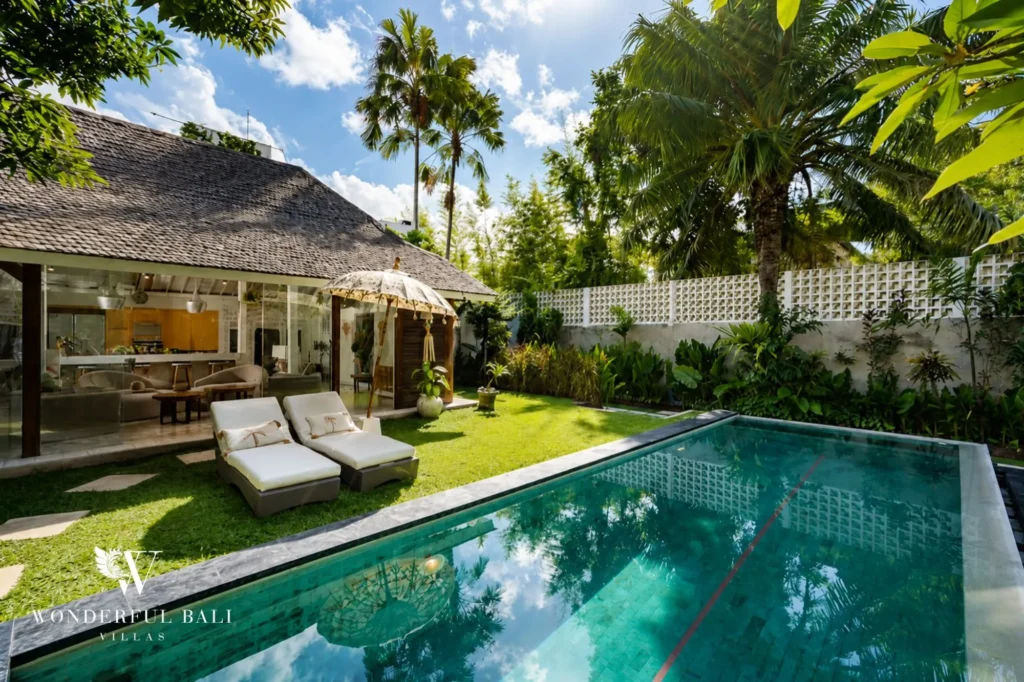 12 m pool lit at evening with villa illuminated, 4-bedroom villa in Petitenget, Seminyak