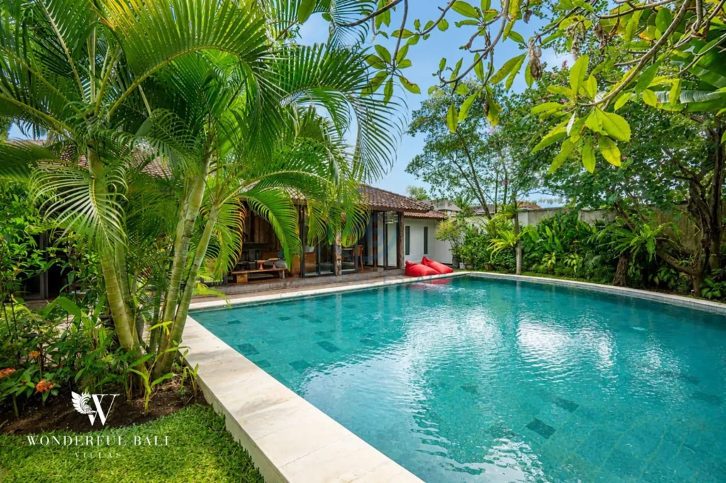 Pool viewed from the tropical garden, 4-bedroom joglo villa in Umalas