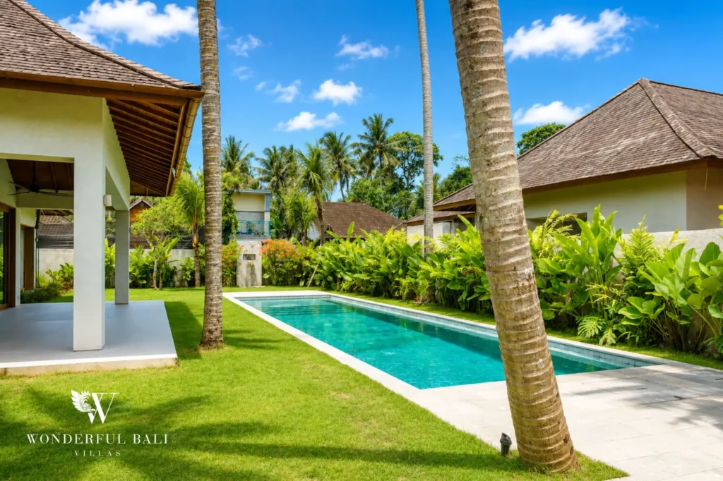 Pool view with tropical palms, 4-bedroom villa in Kaba-Kaba, Tabanan