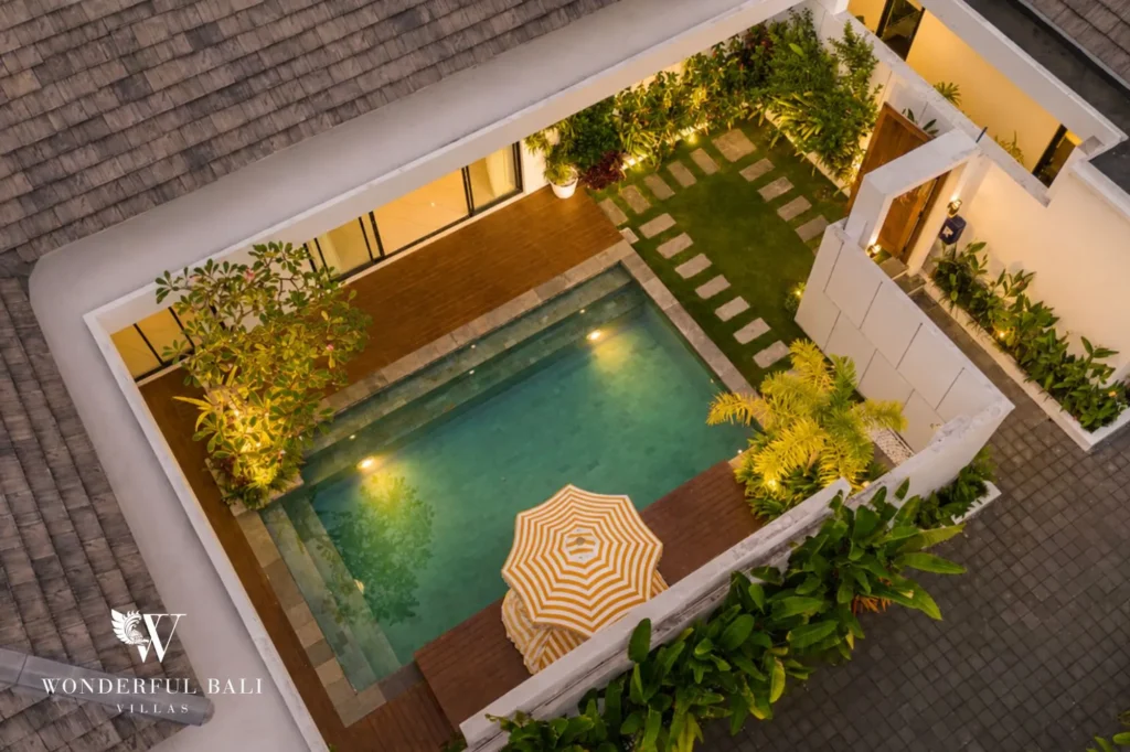 Aerial view of the pool at dusk, 2-bedroom villa in Petitenget, Seminyak