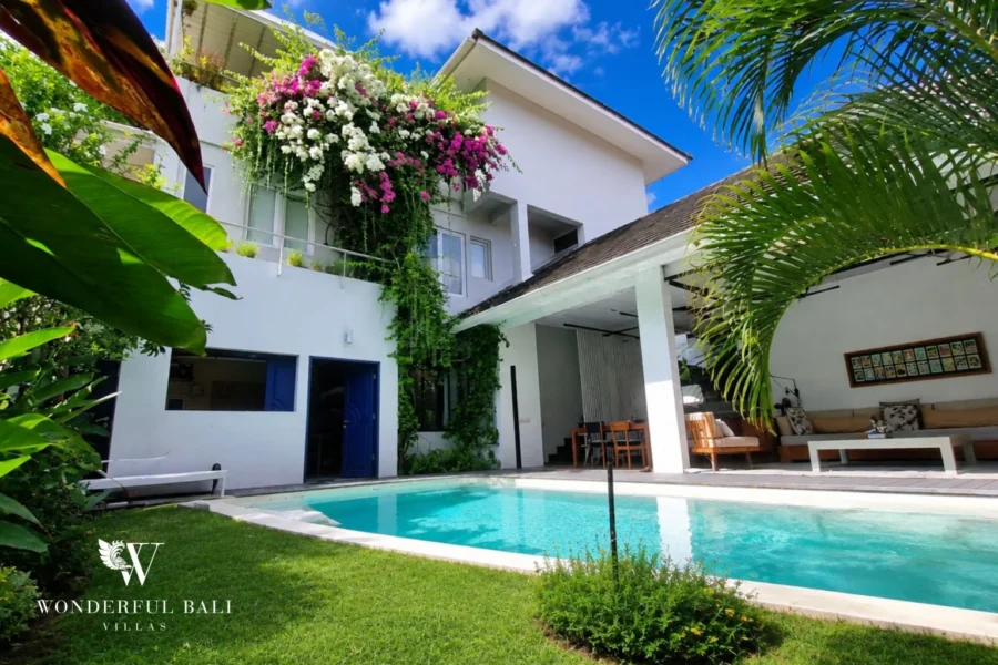 Private pool with bougainvillea-draped pergola at industrial villa in Umalas, Bali