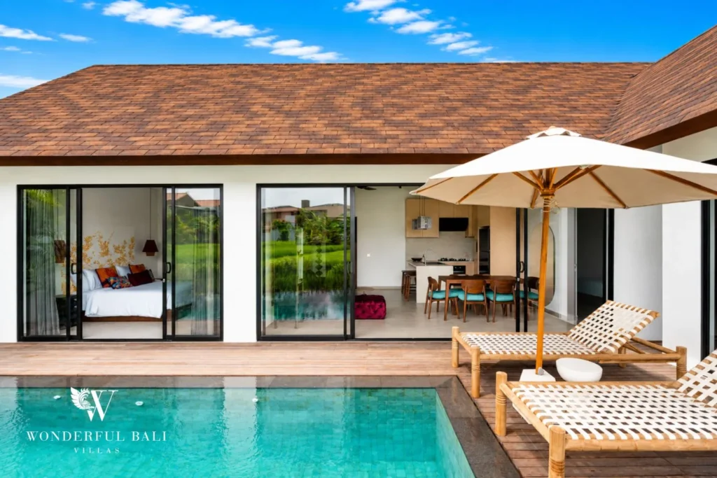3BR villa for monthly rent Canggu — private pool with sun loungers and rice field