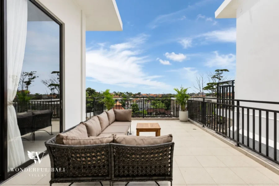 monthly villa rental pererenan — rooftop terrace with lounge seating