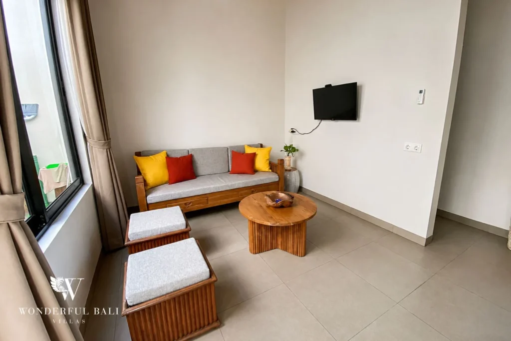 Enclosed living room with Smart TV and air-conditioning at villa in Canggu, Bali