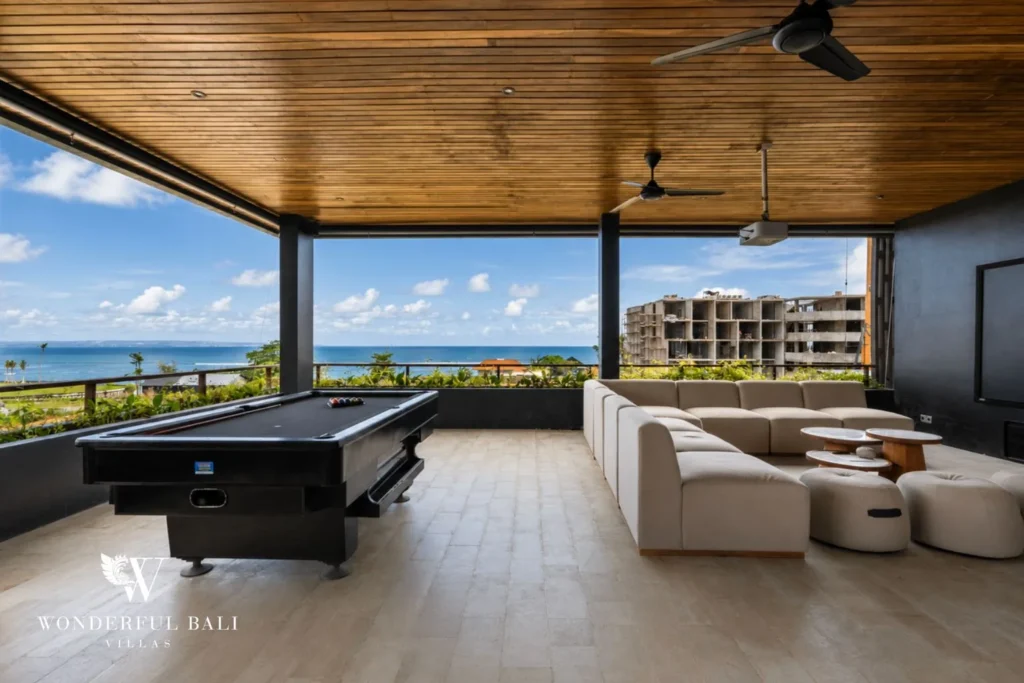5BR villa for long-term rent Cemagi — rooftop lounge with pool table and ocean view