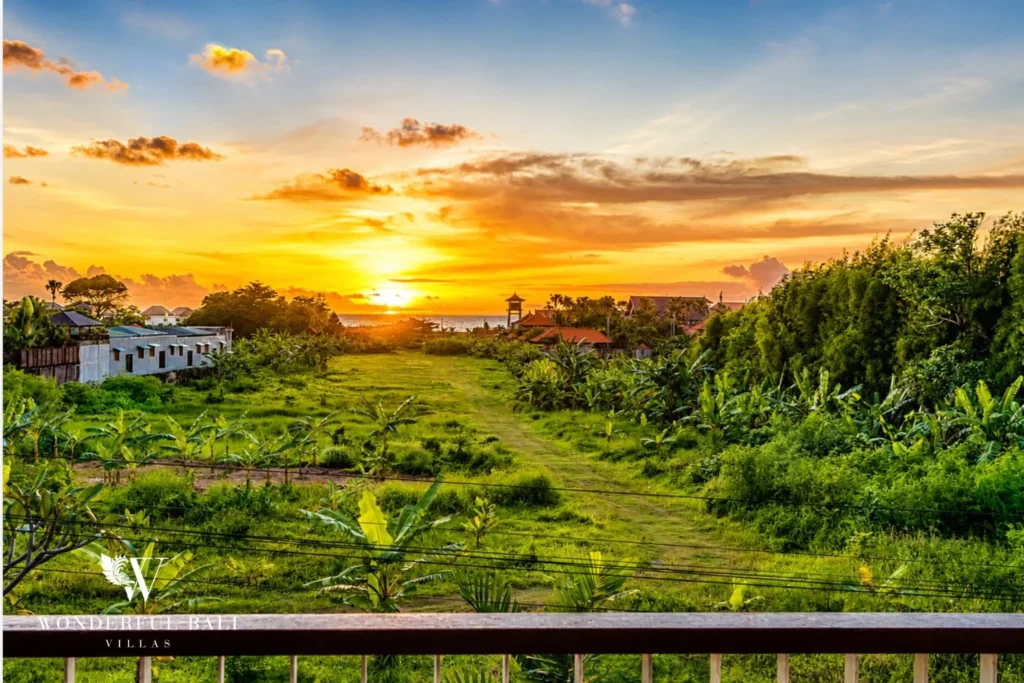 Sunset over the surrounding landscape near the villa in Petitenget, Bali