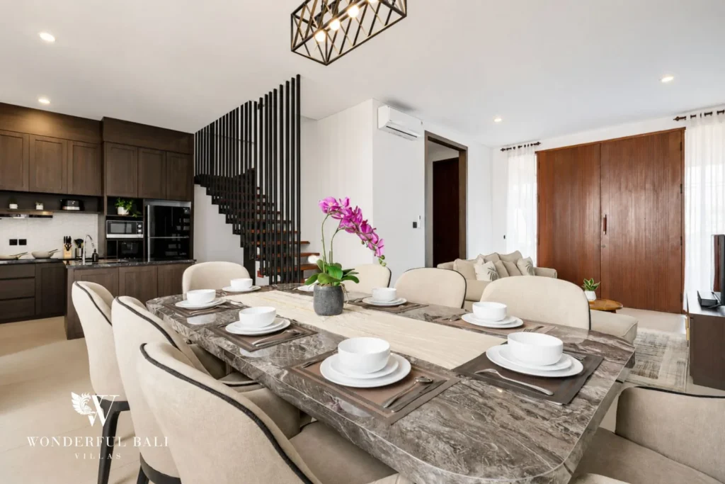 monthly villa rental pererenan — double height kitchen and dining