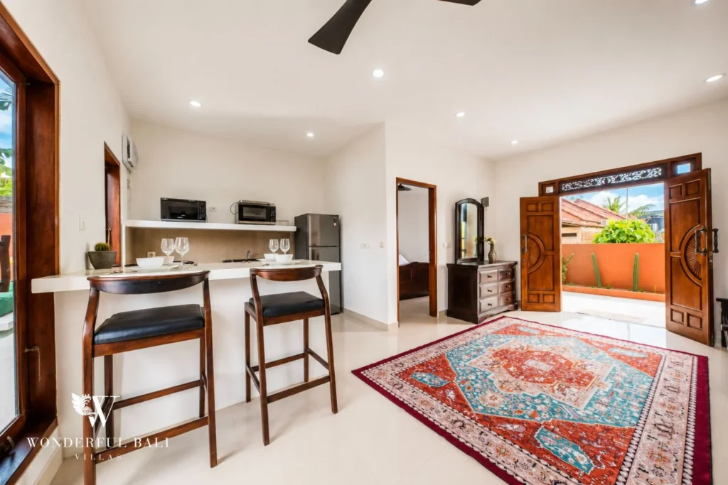 Kitchen with breakfast bar and Persian rug in Nyanyi, Bali