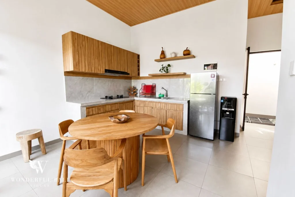 Open kitchen and dining set at villa in Canggu, Bali