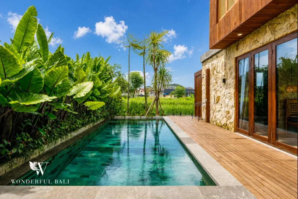 Private swimming pool at a 4-bedroom ocean-view villa in Seseh, Bali