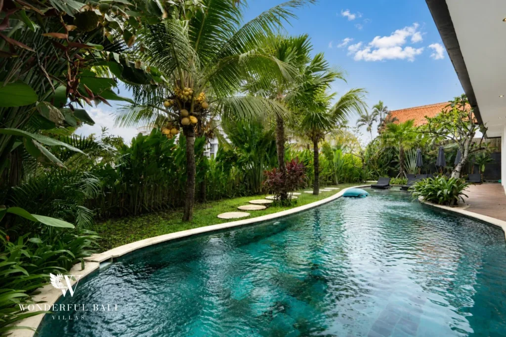 5BR villa for long-term rent Cemagi — freeform pool in tropical garden