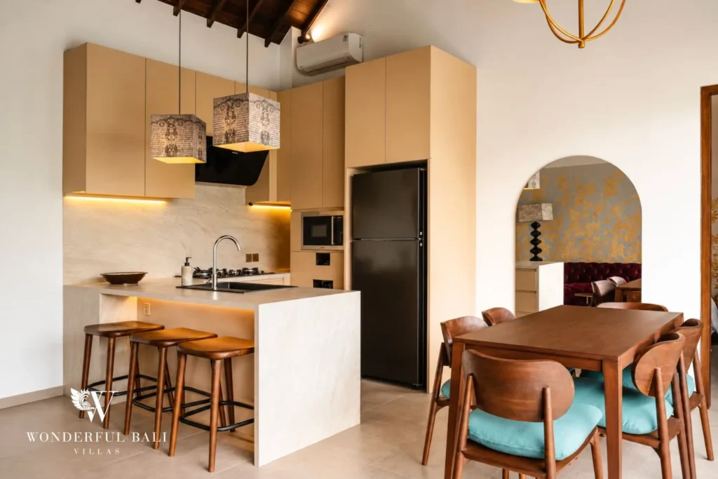 3BR villa for monthly rent Canggu — kitchen with arched window and dining