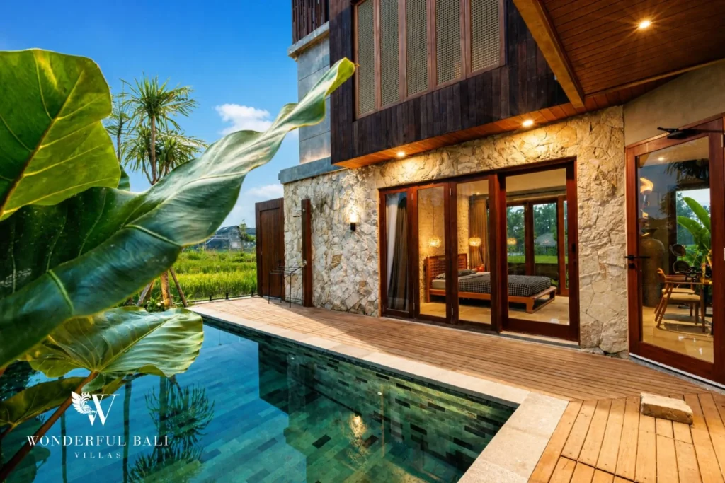 Pool deck at a 4-bedroom ocean-view villa in Seseh, Bali