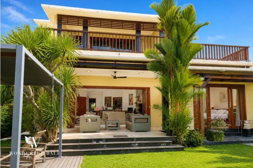 monthly villa rental sanur — two storey villa facade garden