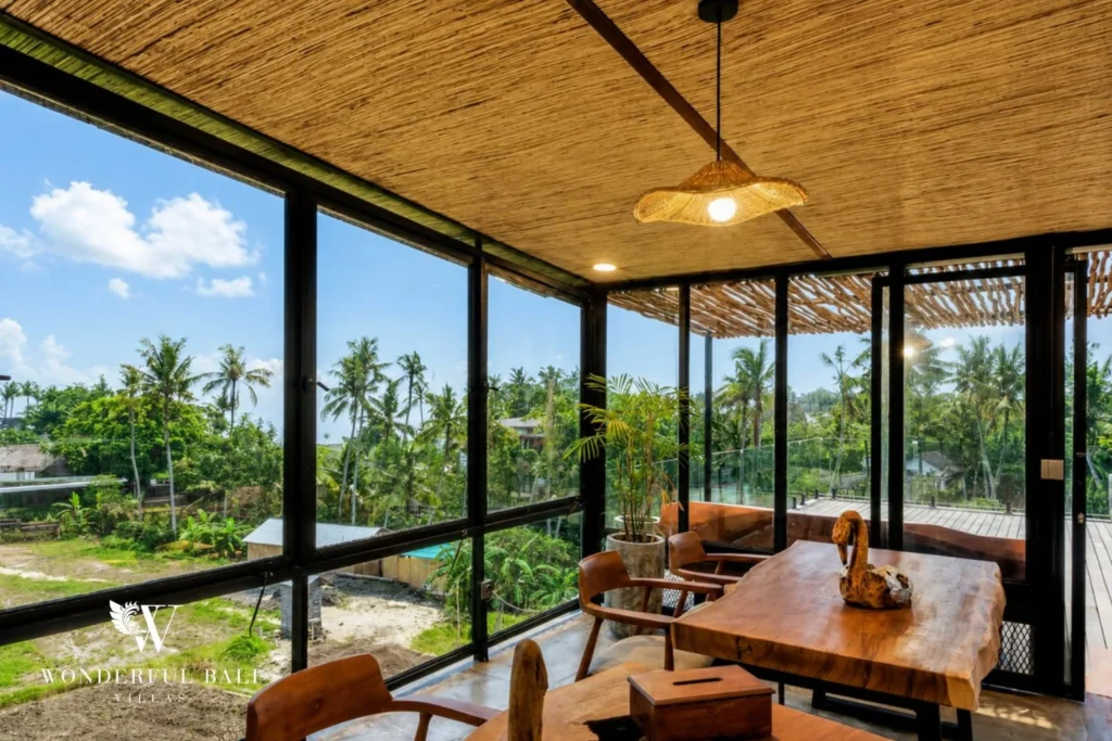 Enclosed air-conditioned living area at a 4-bedroom ocean-view villa in Seseh, Bali
