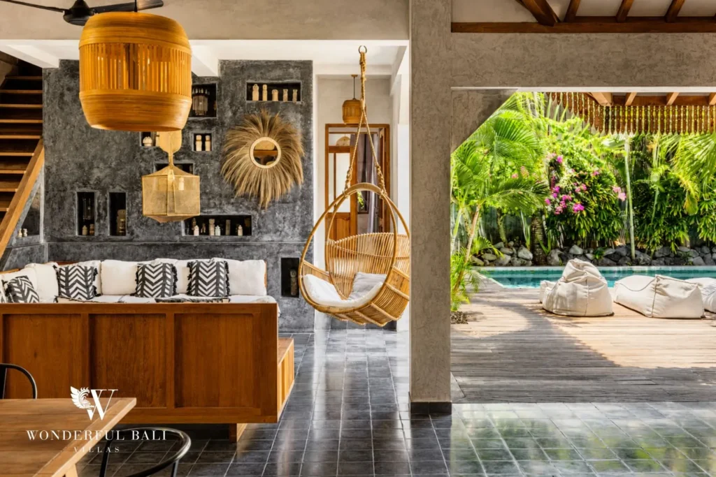 Kitchen with garden view and outdoor daybed at a villa in Canggu, Bali