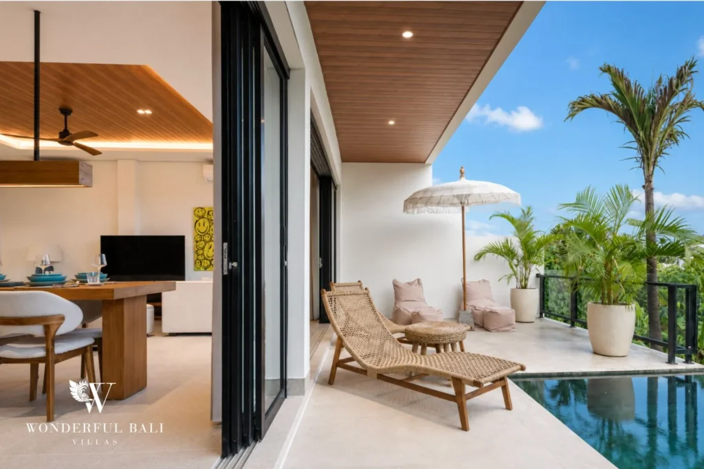 monthly villa rental cemagi — poolside terrace loungers