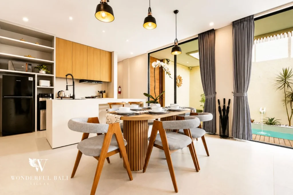 3BR villa for monthly rent Jimbaran — dining area with pendant lights