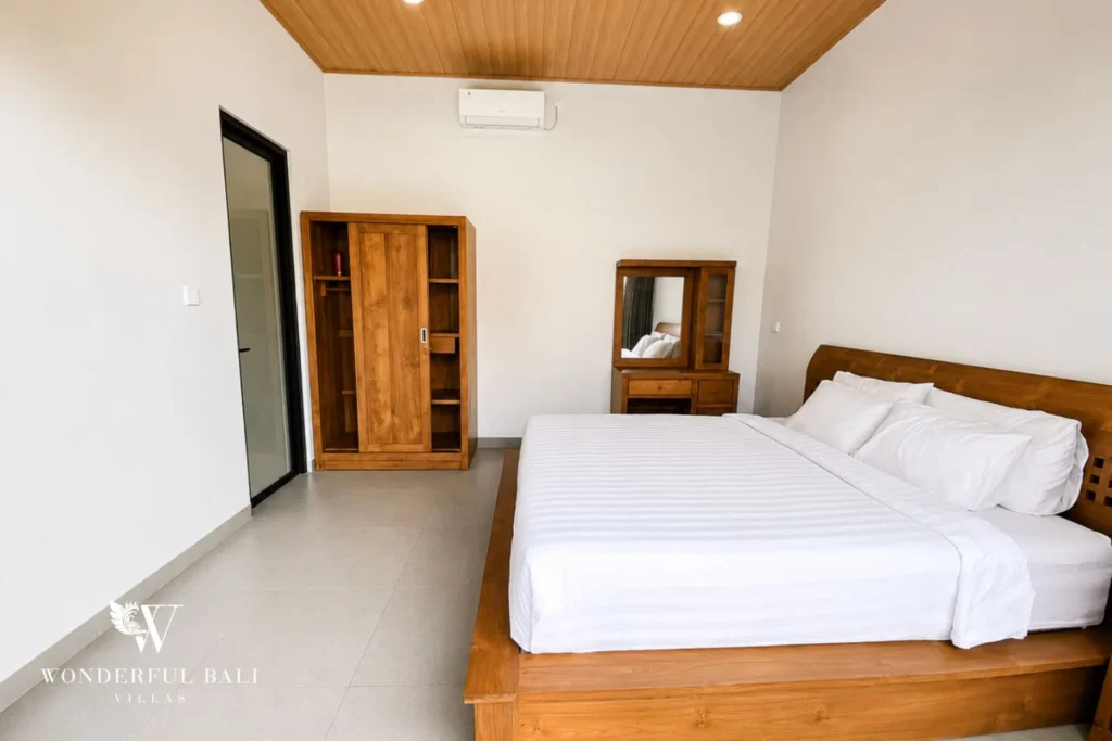 Second bedroom with built-in wardrobe at villa in Canggu, Bali