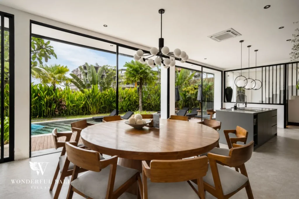 5BR villa for long-term rent Cemagi — dining area with round teak table