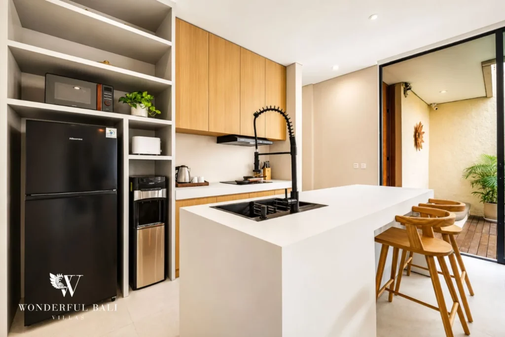 3BR villa for monthly rent Jimbaran — enclosed kitchen with bar counter
