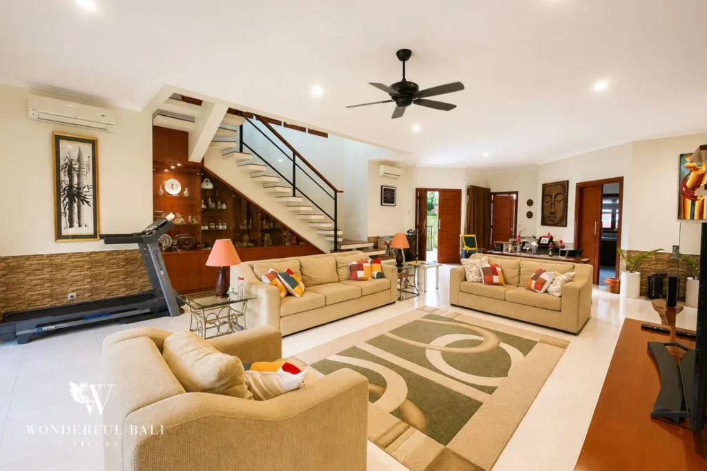 monthly villa rental sanur — living area sofa garden view