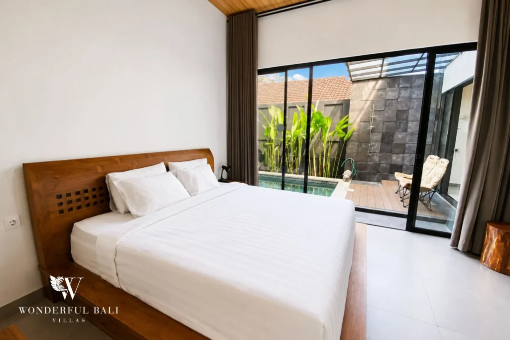 Master bedroom with pool view at villa in Canggu, Bali