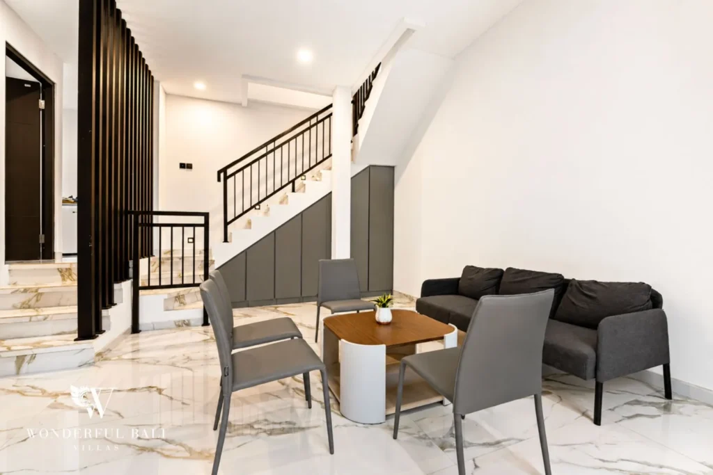 3BR villa for monthly rent Jimbaran — dining area with rattan chairs