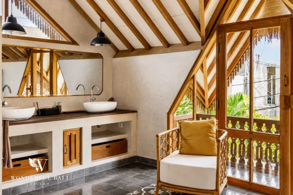 Ensuite bathroom with double vanity and balcony at a villa in Canggu, Bali