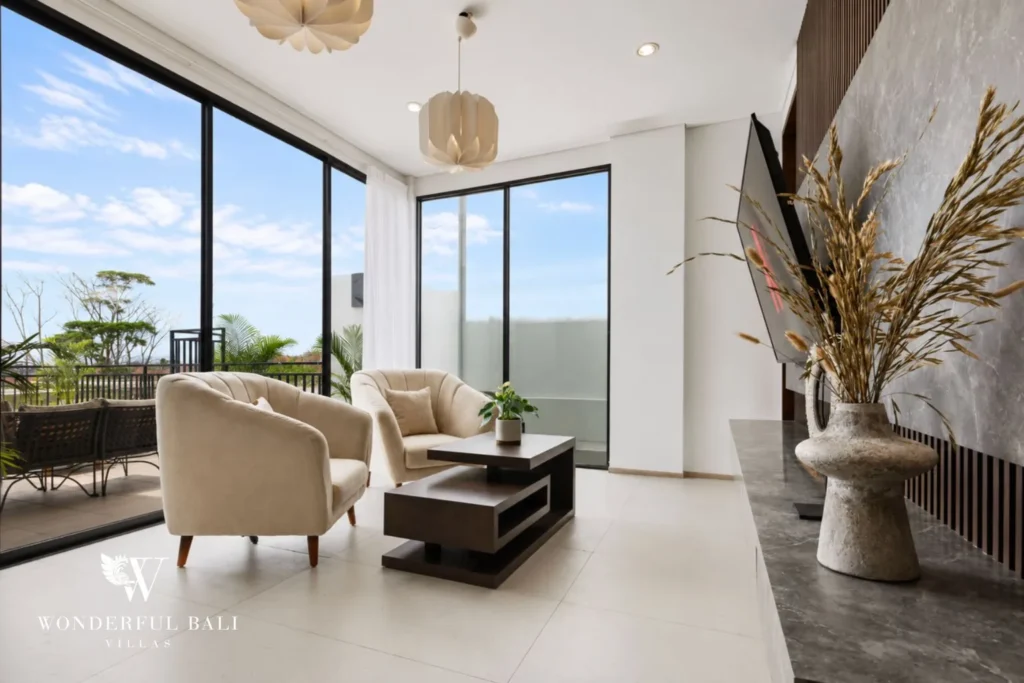 monthly villa rental pererenan — living area with floor to ceiling windows