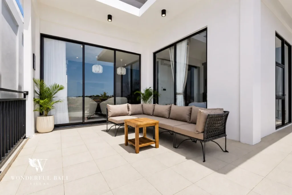 monthly villa rental pererenan — living area with garden view