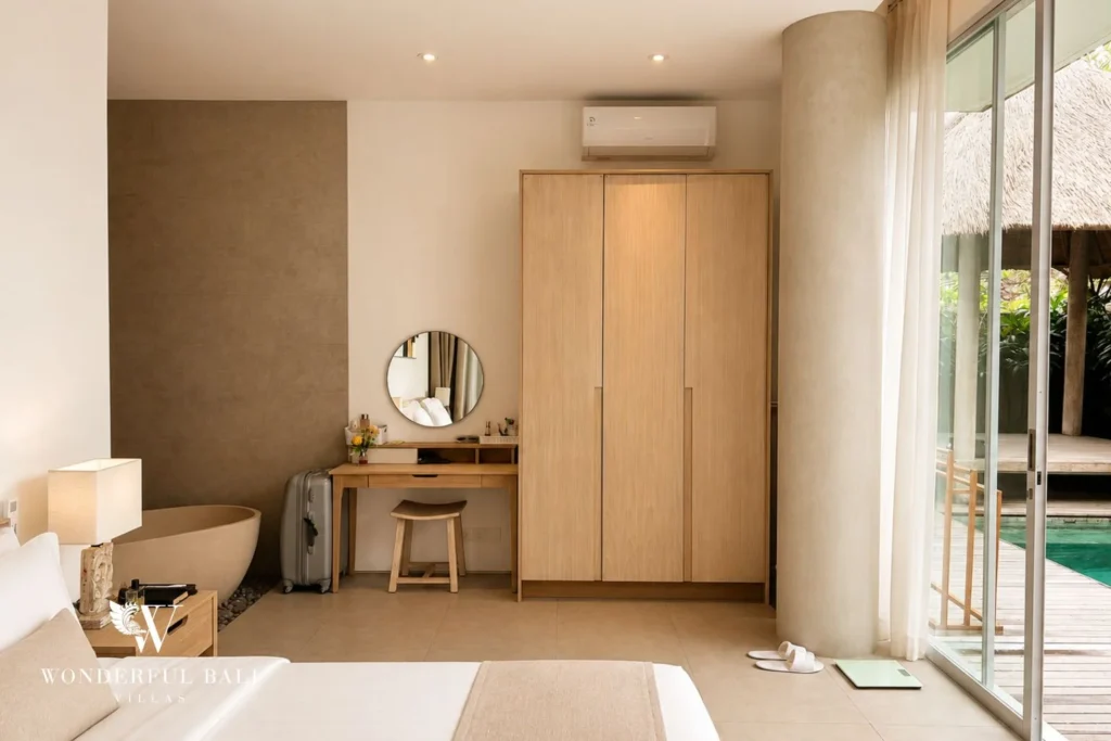 Bedroom with wardrobe and dressing area at villa in Petitenget, Bali