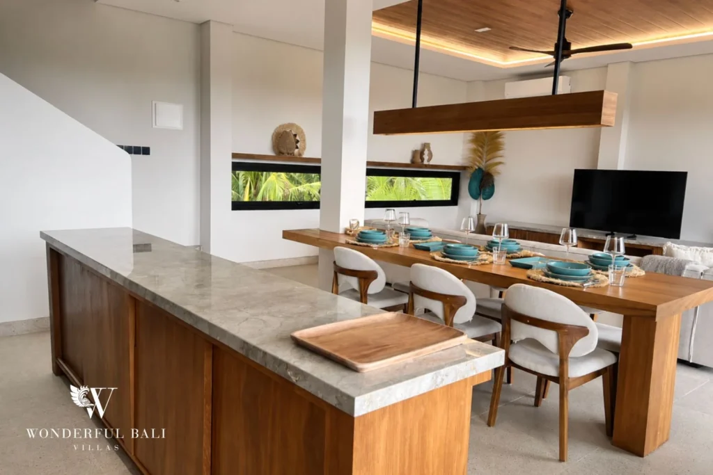 monthly villa rental cemagi — kitchen island dining area