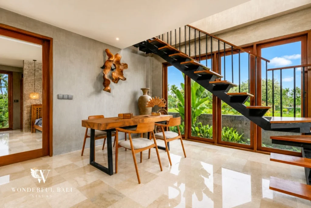 En-suite bedroom with garden view at a 4-bedroom ocean-view villa in Seseh, Bali
