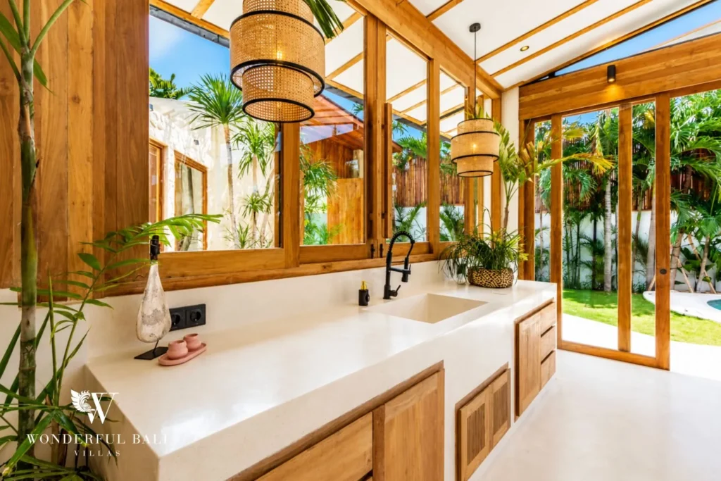 Double-vanity bathroom with garden view at family villa in Umalas, Bali