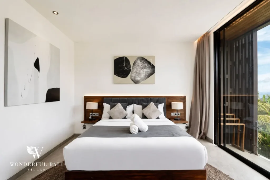 5BR villa for long-term rent Cemagi — bedroom with upholstered headboard