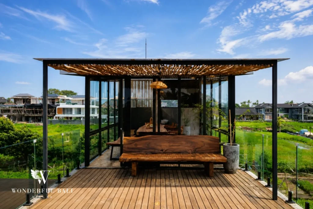 Rooftop terrace with ocean views at a 4-bedroom villa in Seseh, Bali
