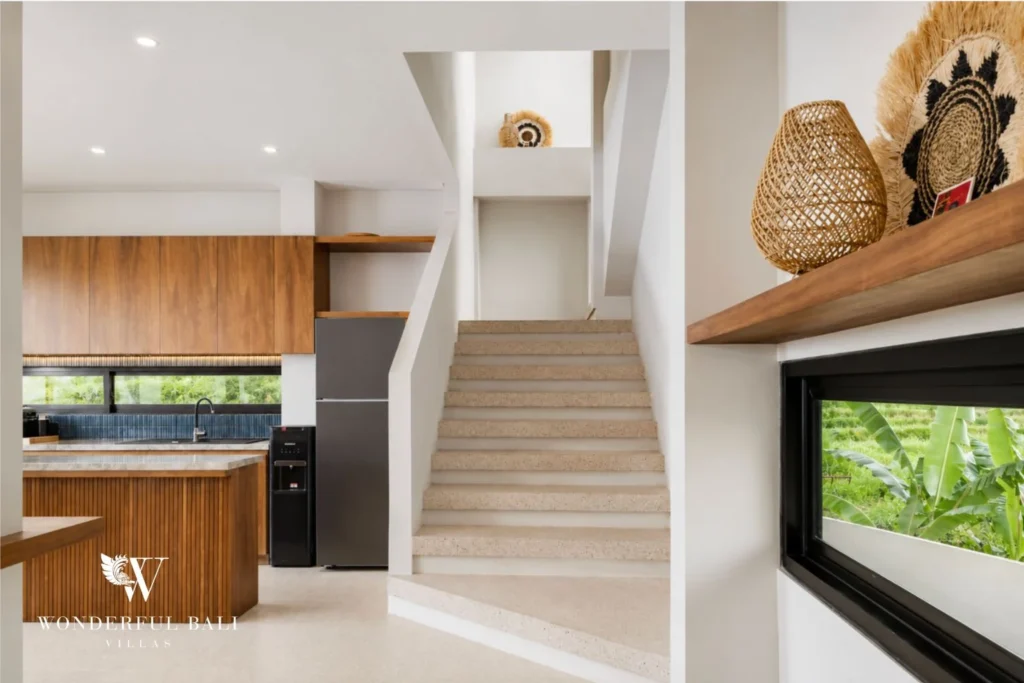 monthly villa rental cemagi — staircase entry artwork