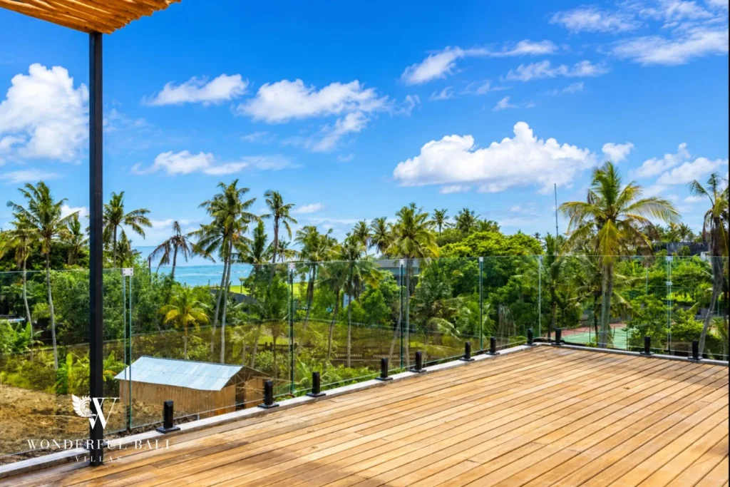 Rooftop terrace with ocean and sunset views at a 4-bedroom villa in Seseh, Bali