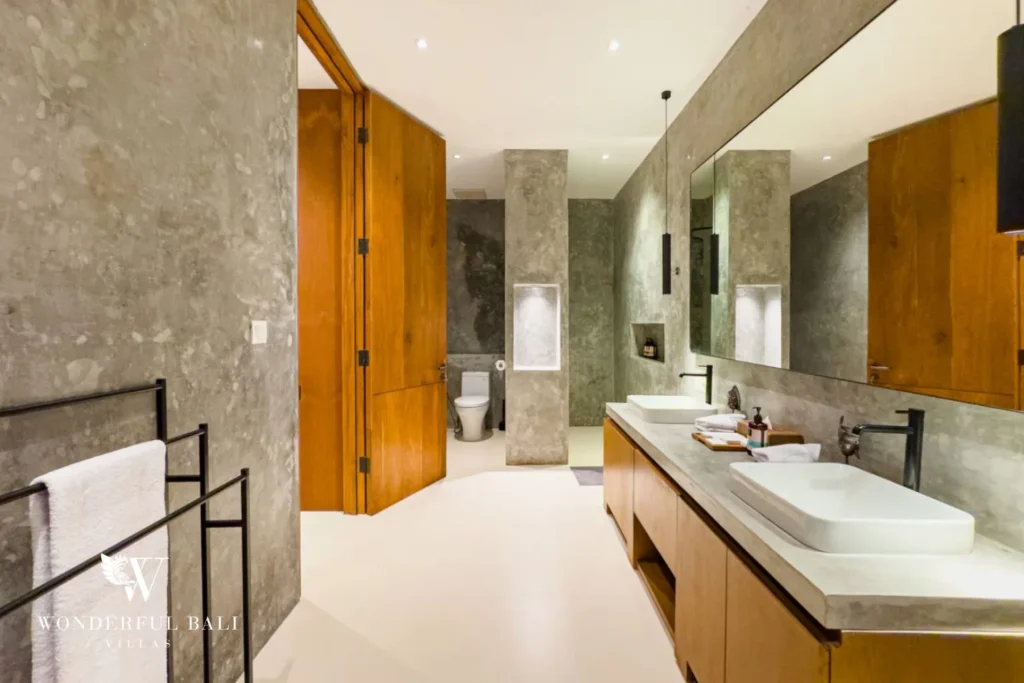 Bathroom vanity with mirror and sunset view at villa in Umalas, Bali