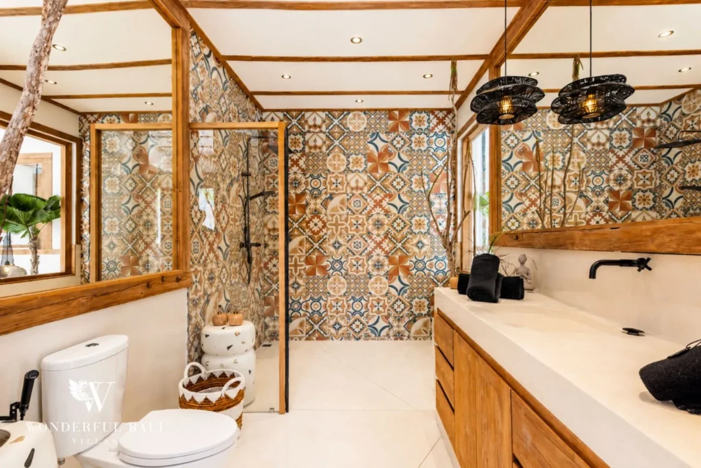 Twin-vanity bathroom with patterned tile at family villa in Umalas, Bali