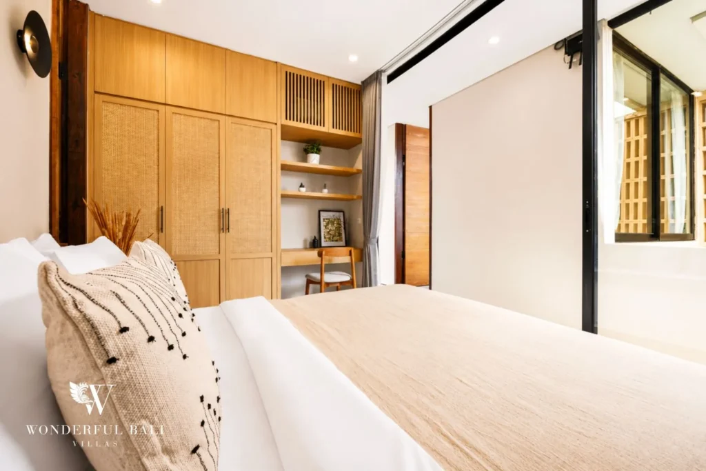 3BR villa for monthly rent Jimbaran — bedroom with wardrobe and cushions