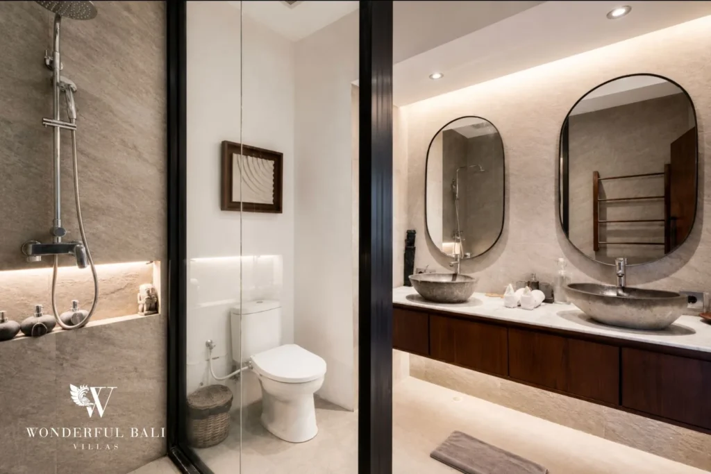5BR villa for long-term rent Cemagi — ensuite bathroom with round mirror